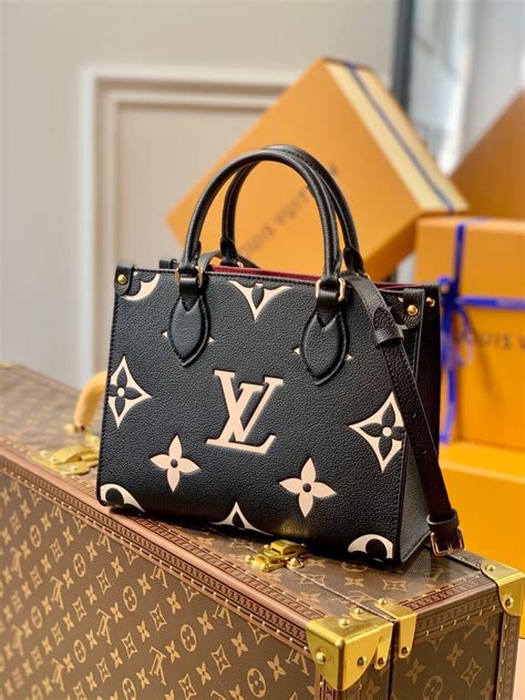 lv black and gold bag|louis vuitton black tote bag.